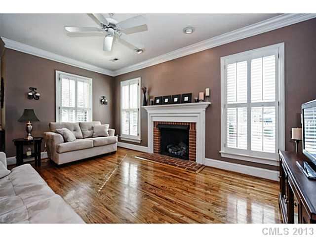 7603 Rathlin Court Charlotte, NC 28270 - Photo 3 of 15 a living room with furniture and a fireplace