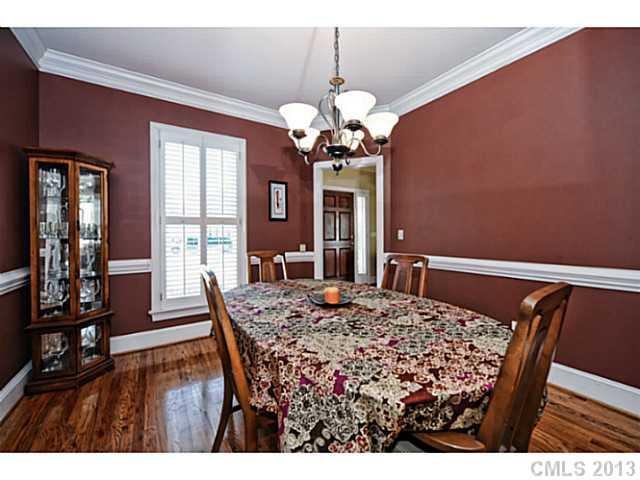 7603 Rathlin Court Charlotte, NC 28270 - Photo 5 of 15 a view of a dining room with furniture and wooden floor