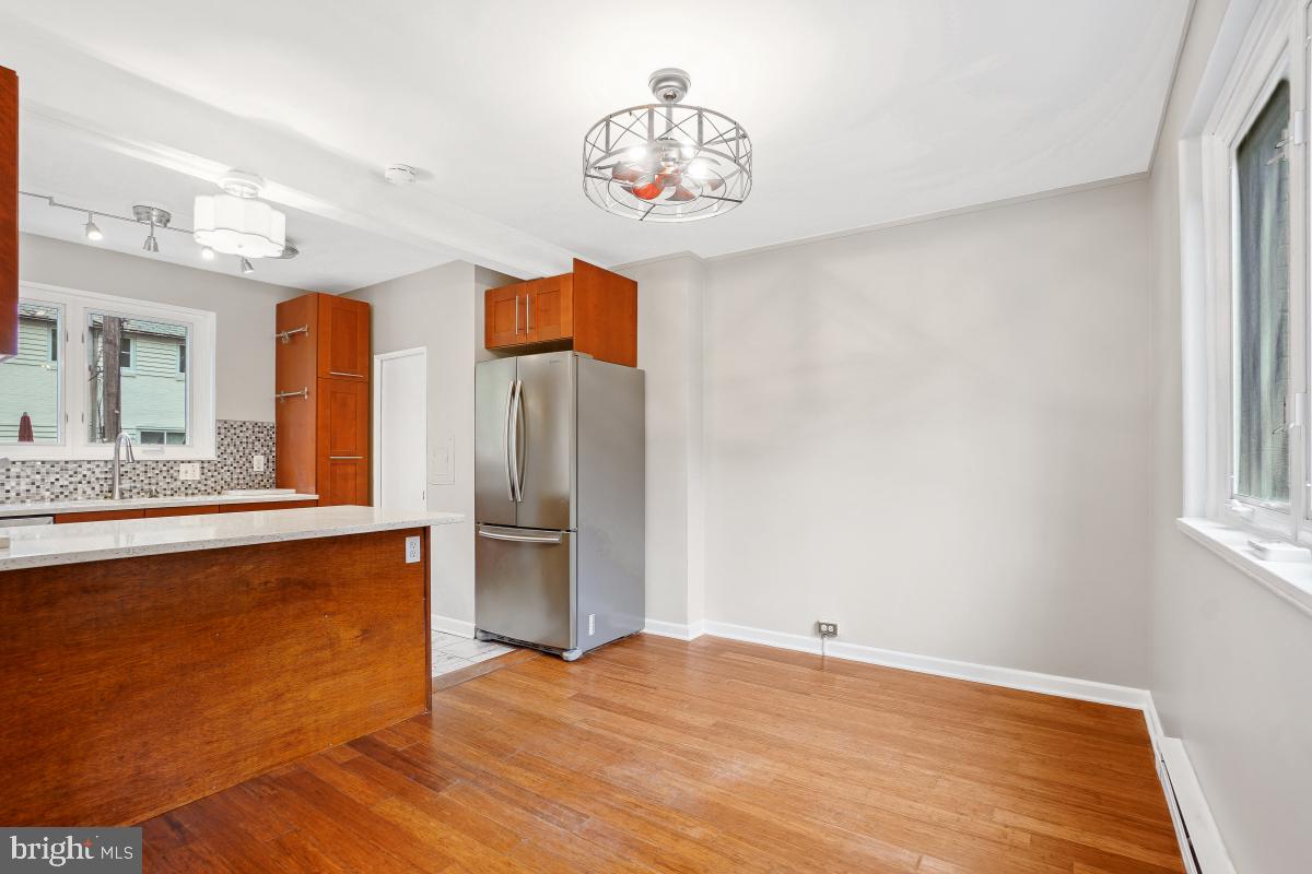 33 Ridge Road Greenbelt, MD 20770 - Photo 12 of 29 a view of a kitchen with a sink and a refrigerator