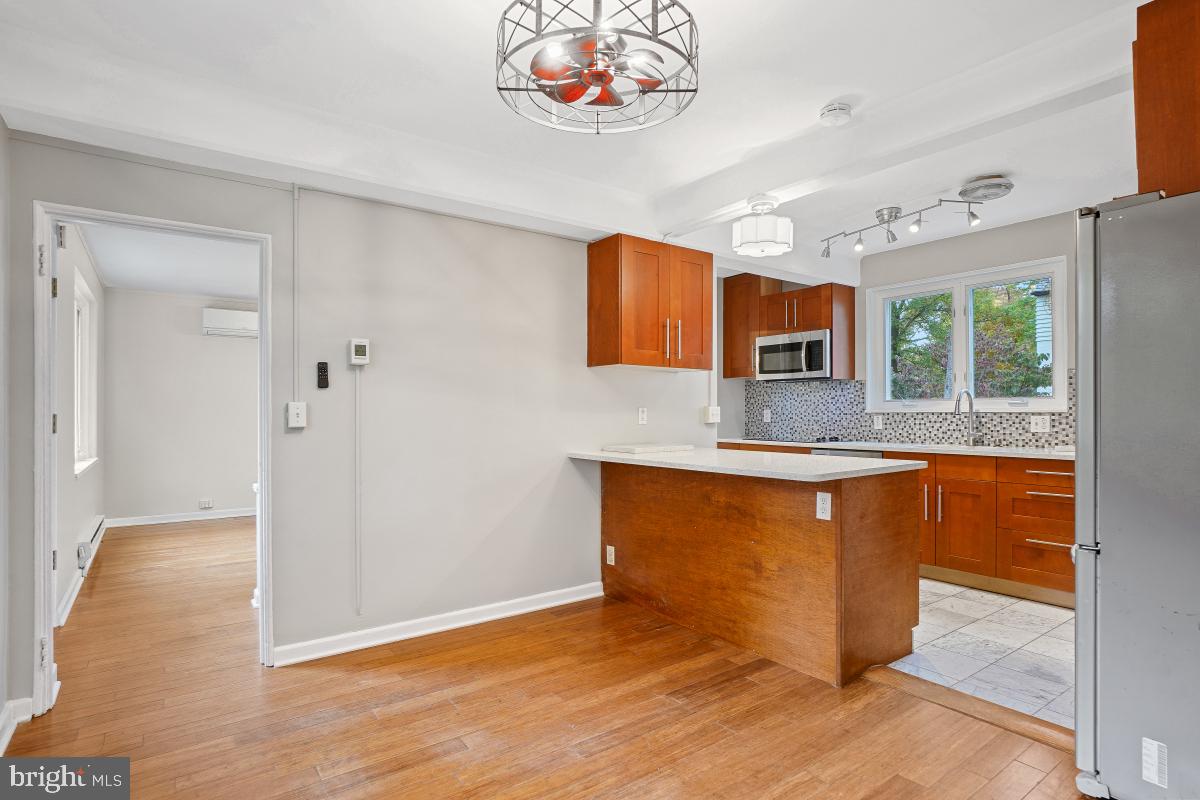 33 Ridge Road Greenbelt, MD 20770 - Photo 13 of 29 a view of kitchen with stainless steel appliances granite countertop a stove and a sink