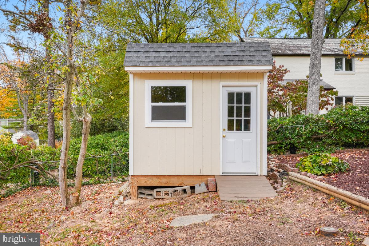33 Ridge Road Greenbelt, MD 20770 - Photo 28 of 29 a view of a house with a yard