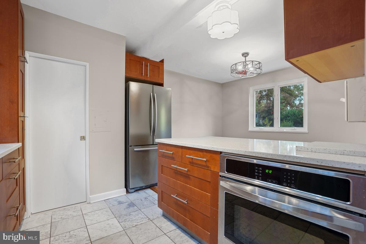 33 Ridge Road Greenbelt, MD 20770 - Photo 10 of 29 a kitchen with a stove and a sink
