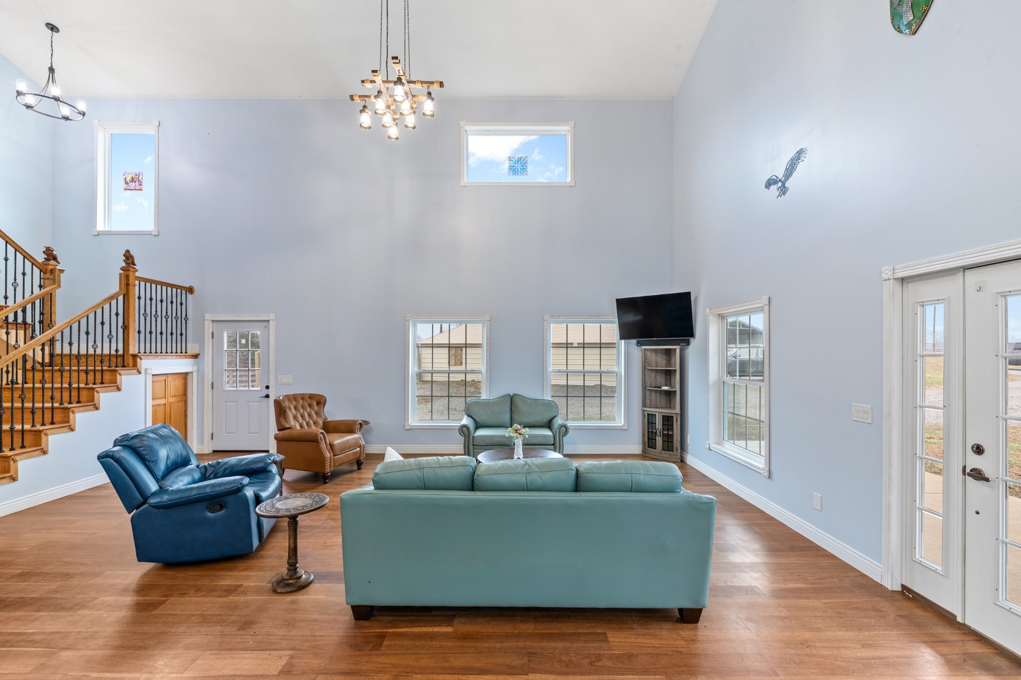 1221 Johnson Branch Road Pulaski, TN 38478 - Photo 15 of 99 a living room with furniture fireplace and a flat screen tv