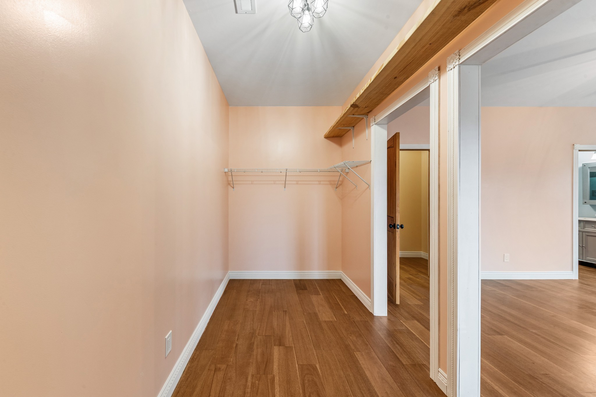 1221 Johnson Branch Road Pulaski, TN 38478 - Photo 39 of 99 a view of a hallway with wooden floor and staircase