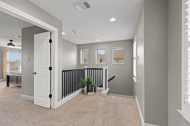 a view of a hallway with closet area