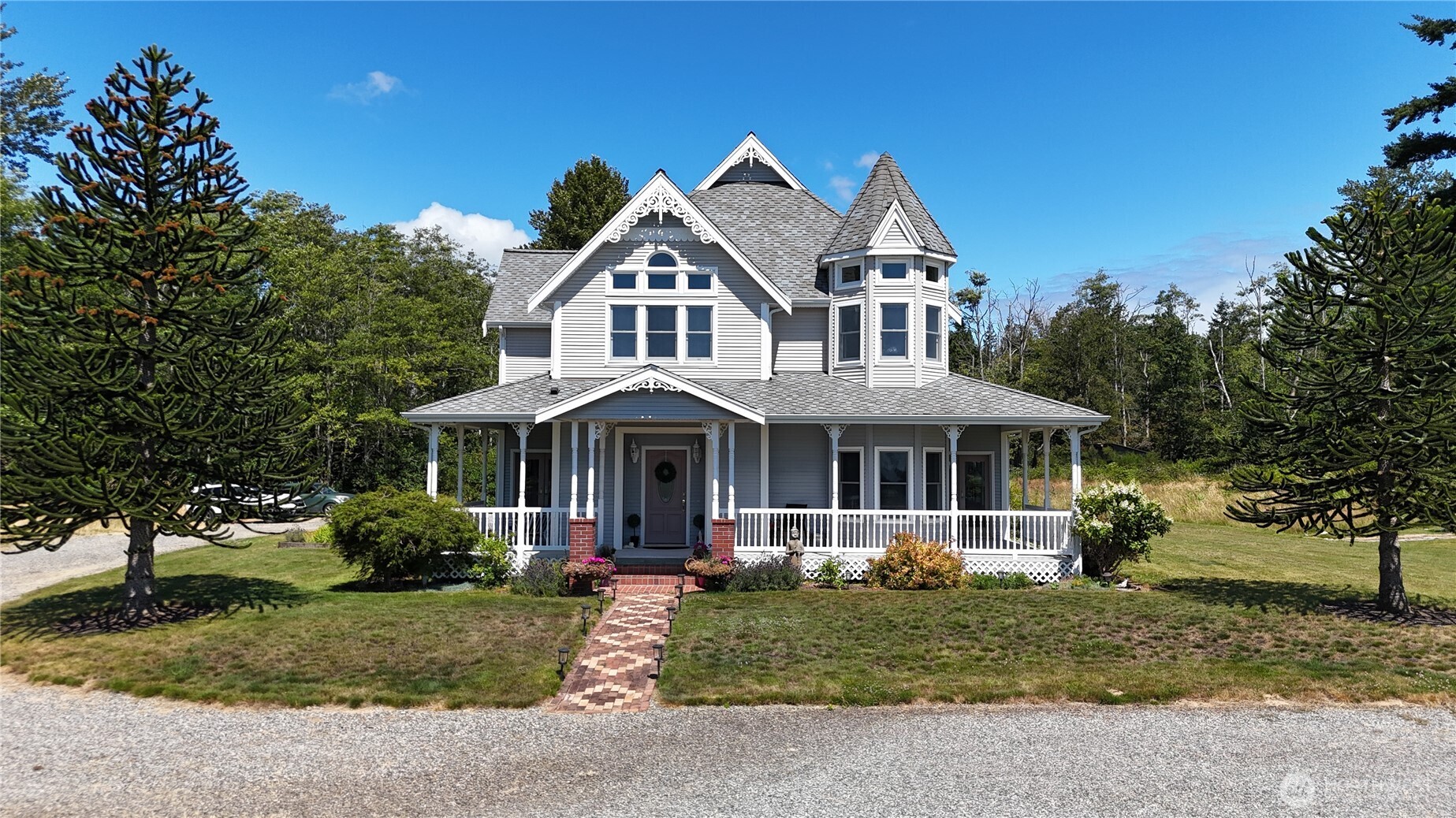 2950 Aldergrove Road Ferndale, WA 98248 - Photo 1 of 39 a front view of a house with a garden