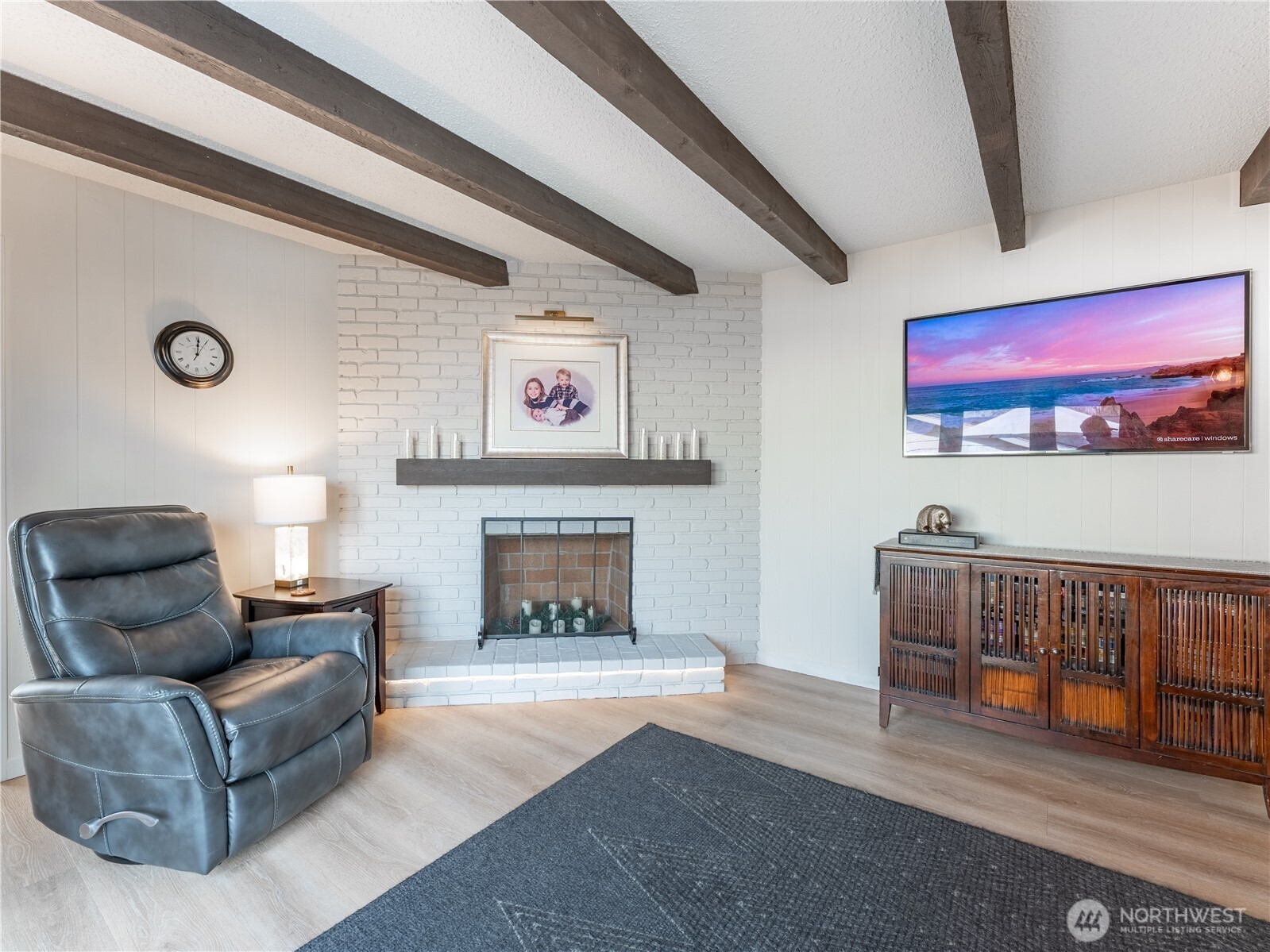 934 Stevens Street Wenatchee, WA 98801 - Photo 15 of 39 a living room with furniture and a fireplace