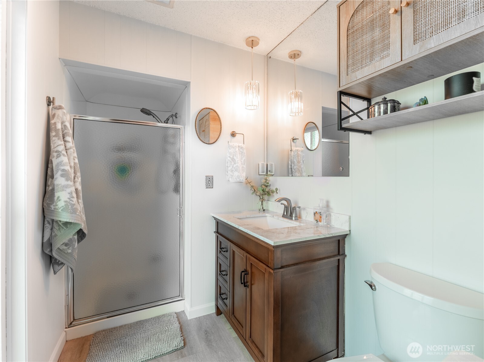 934 Stevens Street Wenatchee, WA 98801 - Photo 20 of 39 a bathroom with a sink a toilet and mirror