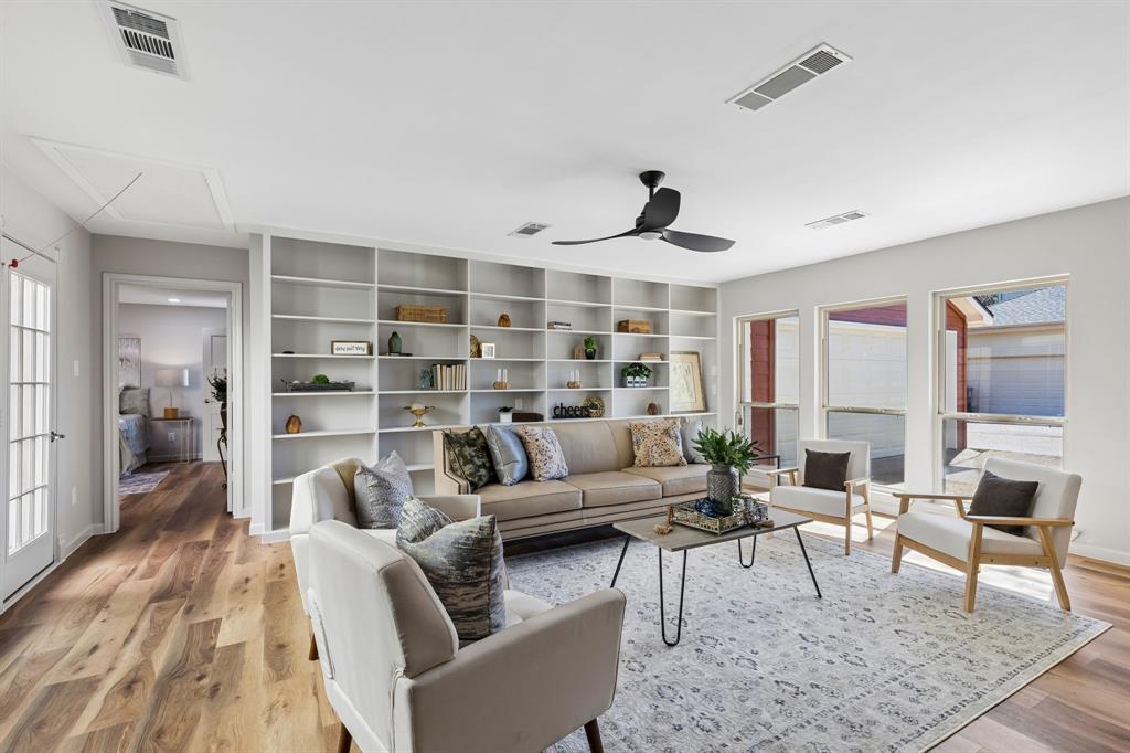 8115 Old Moss Road Dallas, TX 75231 - Photo 22 of 25 Large Family Room with built in bookshelves