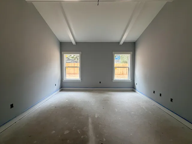 an empty room with windows