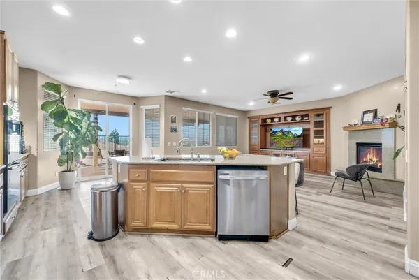 a kitchen with lots of counter top space and dining table