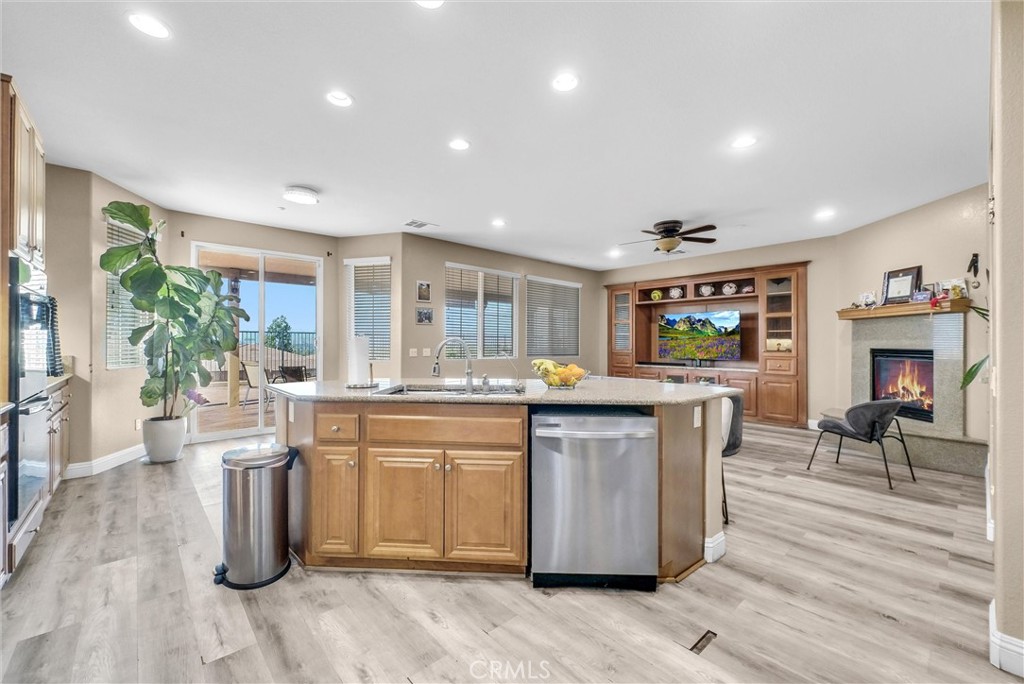 18388 Hidden Ranch Road Riverside, CA 92508 - Photo 14 of 49 a kitchen with lots of counter top space and dining table