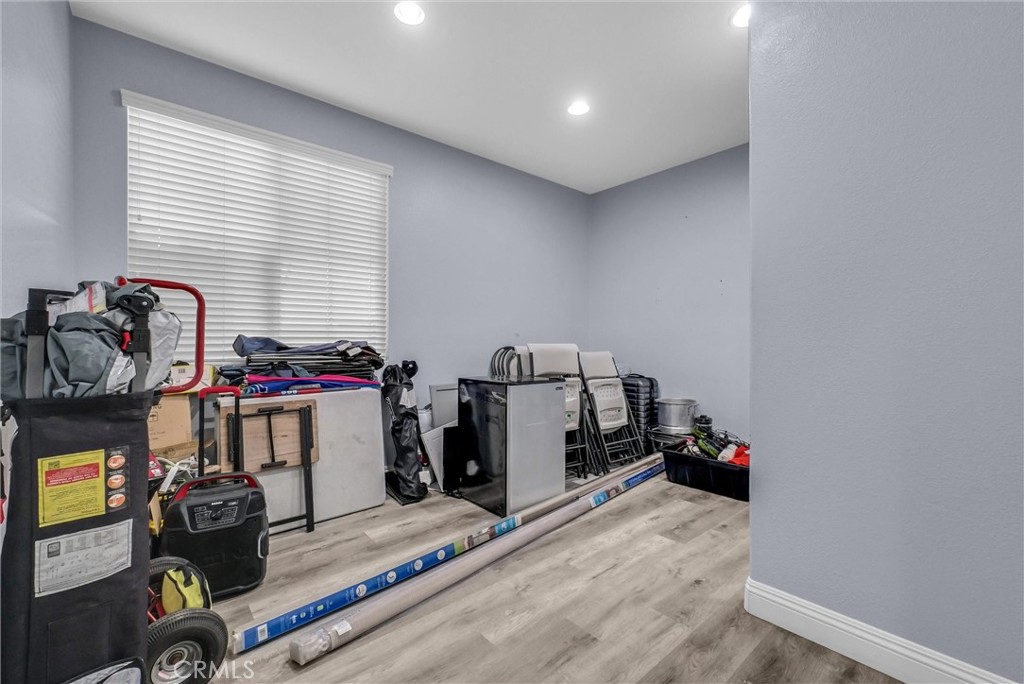 18388 Hidden Ranch Road Riverside, CA 92508 - Photo 18 of 49 a view of a room with gym equipment