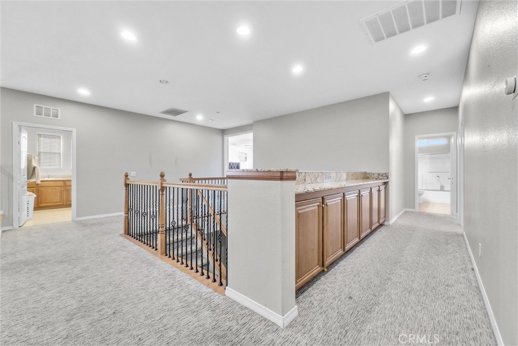 18388 Hidden Ranch Road Riverside, CA 92508 - Photo 37 of 49 a view of a room with lots of white furniture