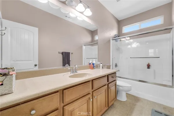 a room with gym equipment and window