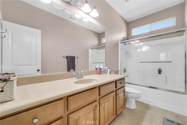 a room with gym equipment and window