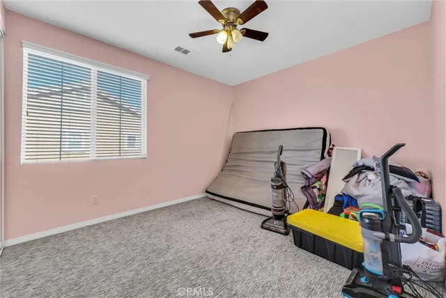 a bathroom with a granite countertop sink mirror and double