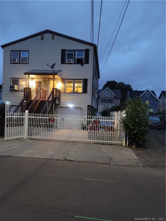 a view of a porch with a small yard