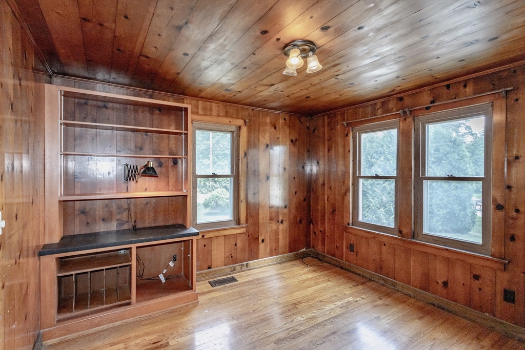 94 Holyoke Road Westfield, MA 01085 - Photo 11 of 42 a room with wooden floors and windows
