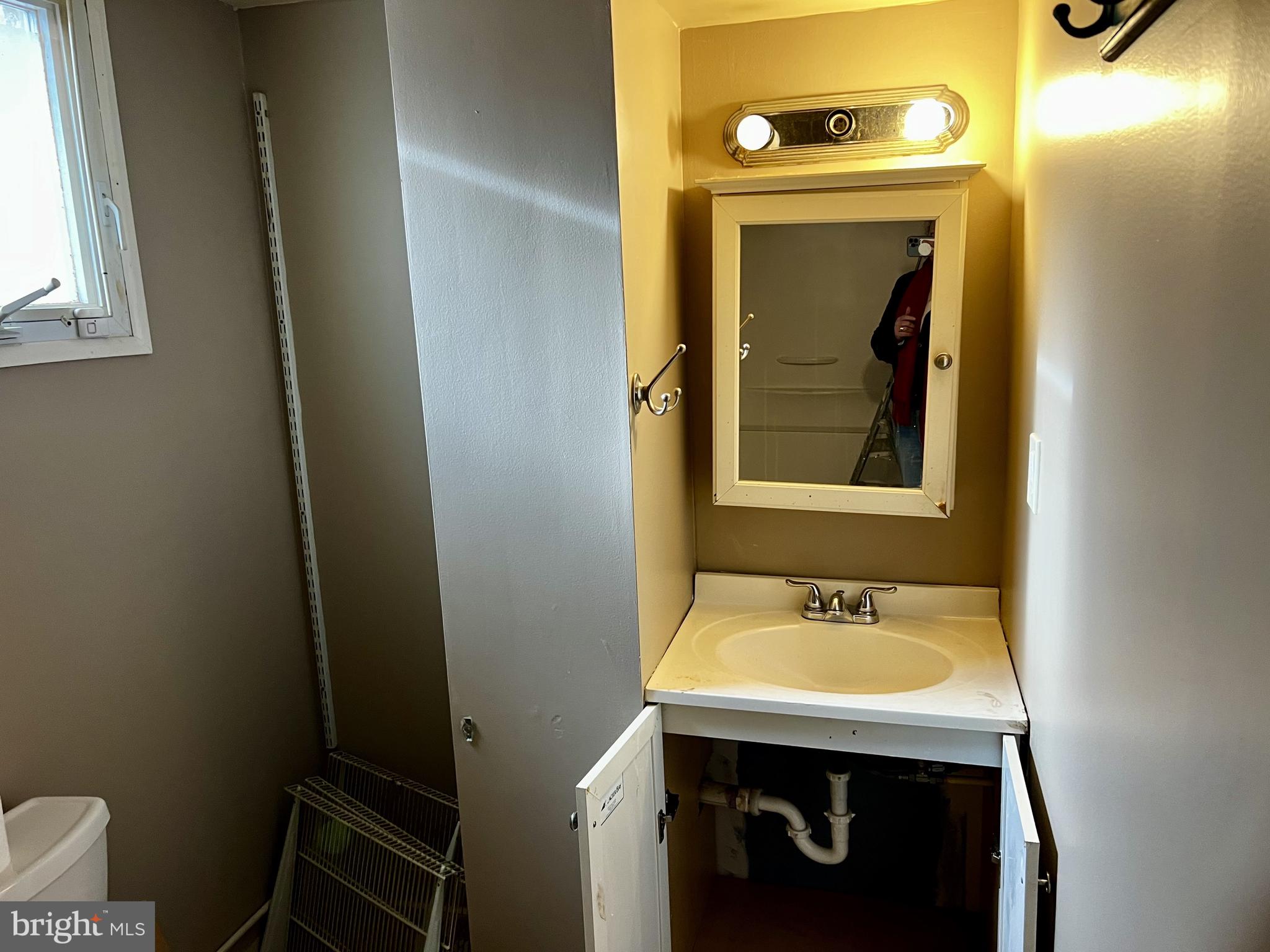 139 Carter Road Elkton, MD 21921 - Photo 19 of 27 a bathroom with a sink and a mirror