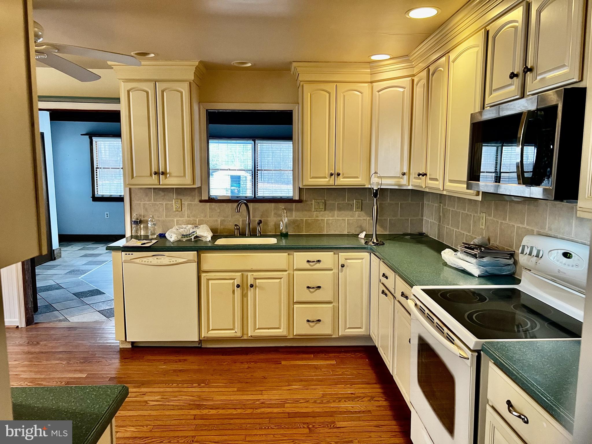 139 Carter Road Elkton, MD 21921 - Photo 7 of 27 a kitchen with a sink stove top oven and cabinets