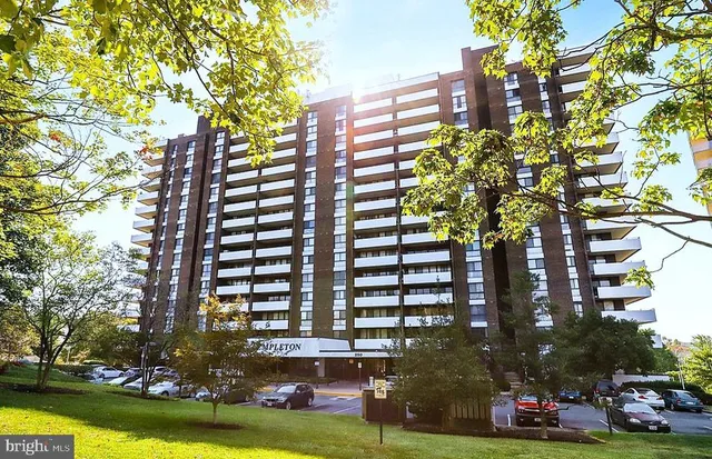 a cars parked in front of a building