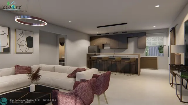 a kitchen with stainless steel appliances granite countertop a sink wooden cabinets and a granite counter tops