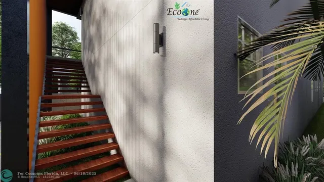 a view of staircase with wooden floor