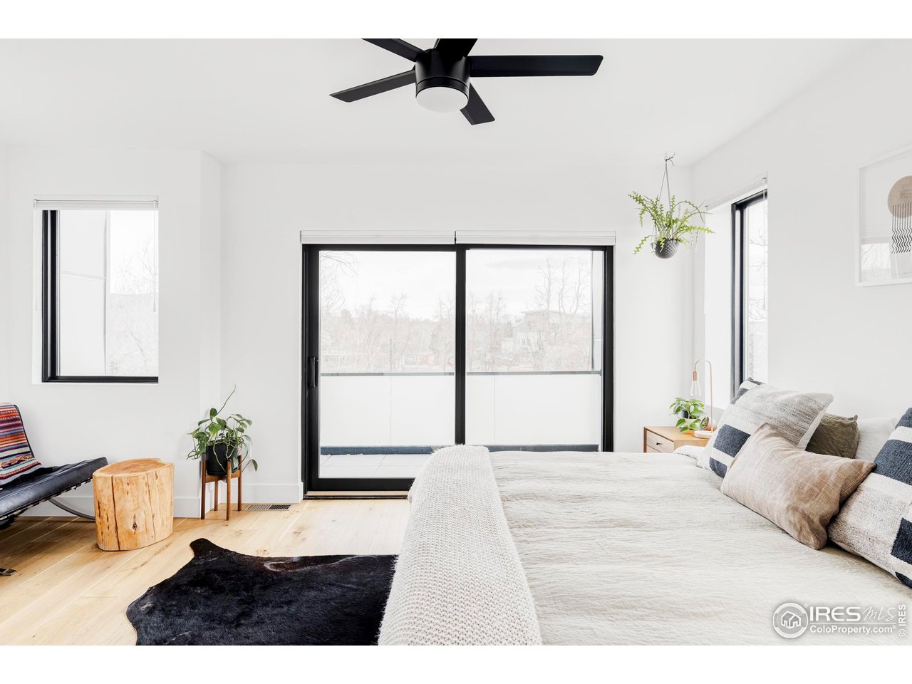 2465 Walnut Street, Unit 13 Boulder, CO 80302 - Photo 12 of 28 a living room with furniture and a large window