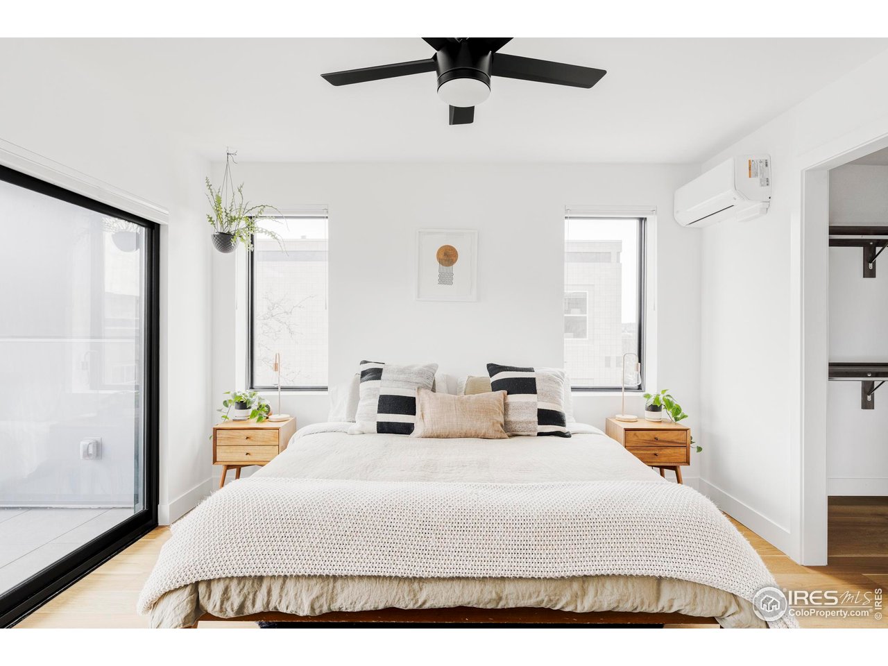 2465 Walnut Street, Unit 13 Boulder, CO 80302 - Photo 14 of 28 a bedroom with a bed a window and dresser