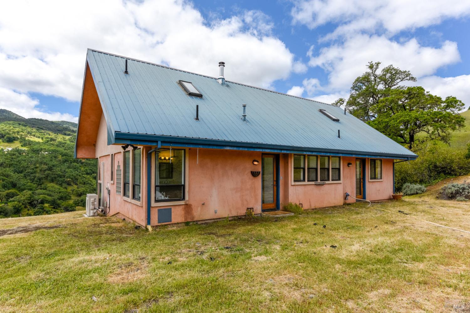 4610 Feliz Creek Road Hopland, CA 95449 - Photo 4 of 44 a front view of house with yard