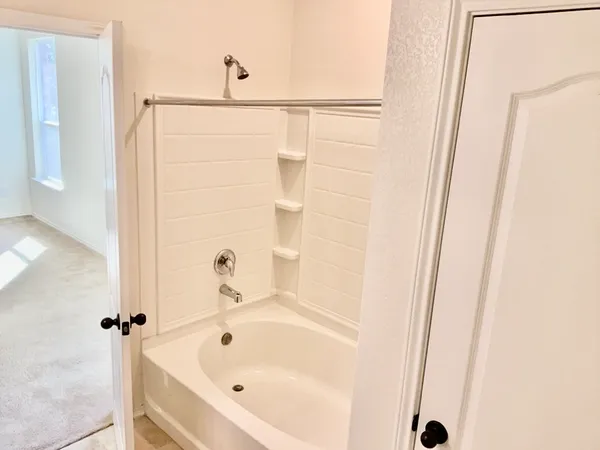 a bathroom with a bathtub