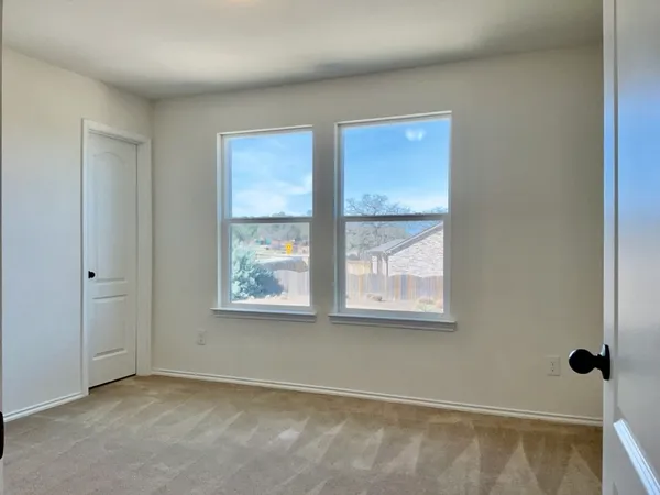 an empty room with window