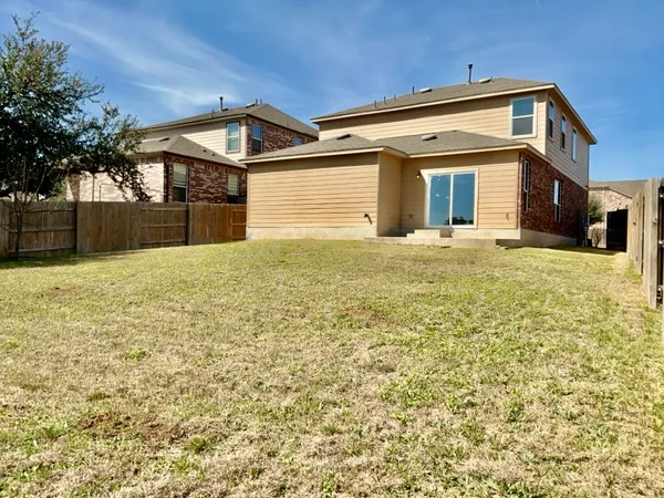 a front view of house with yard