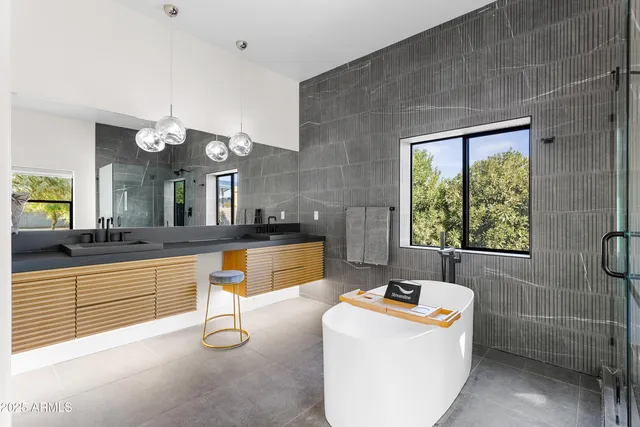 a bathroom with a shower a toilet and a sink