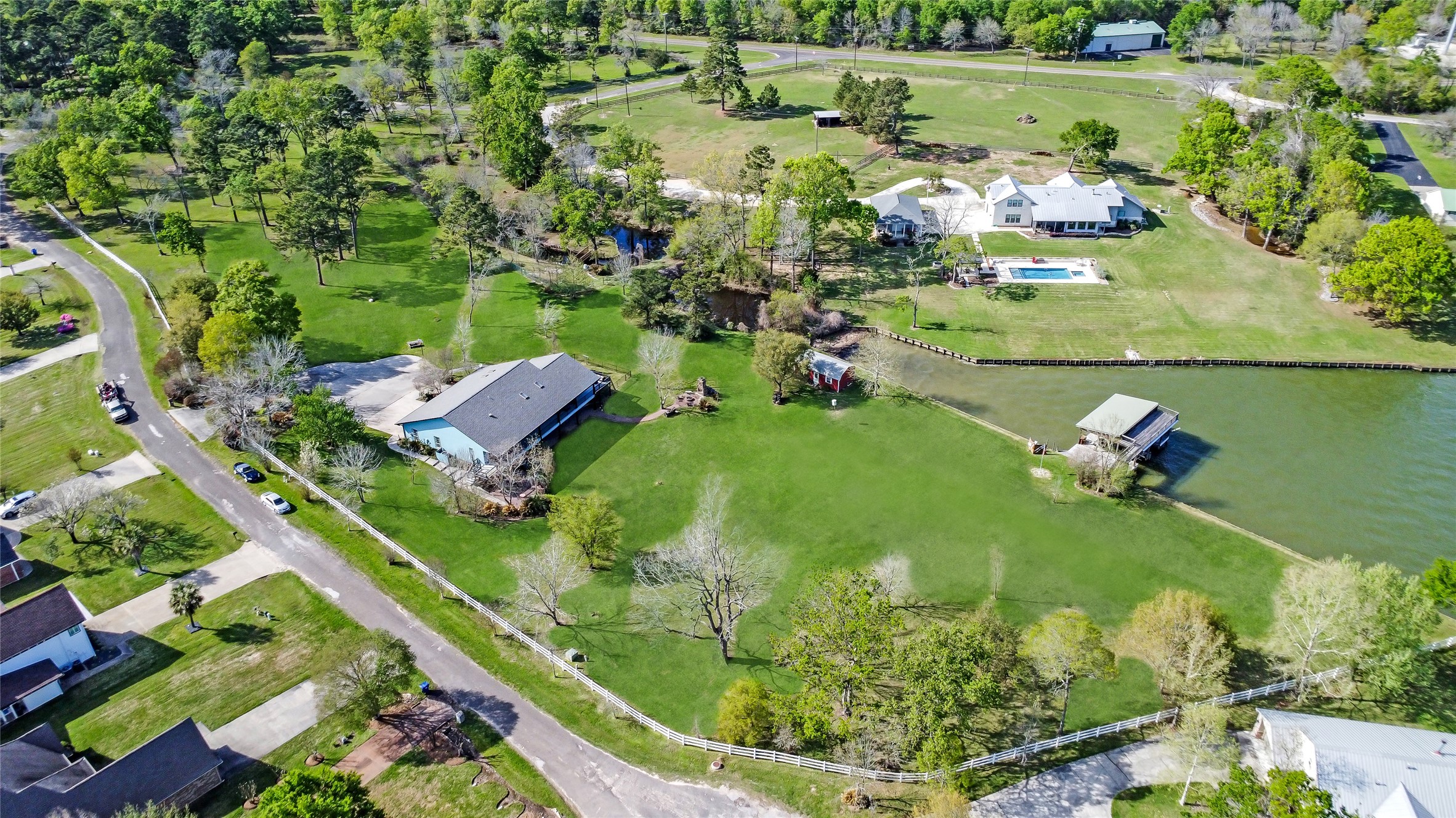 Welcome to 367 Fawn Road, a beautifully updated home set on a fenced and gated 5.8 acres of unrestricted use land on Lake Livingston with lake with immediate use access via a boathouse on the lake inlet.
