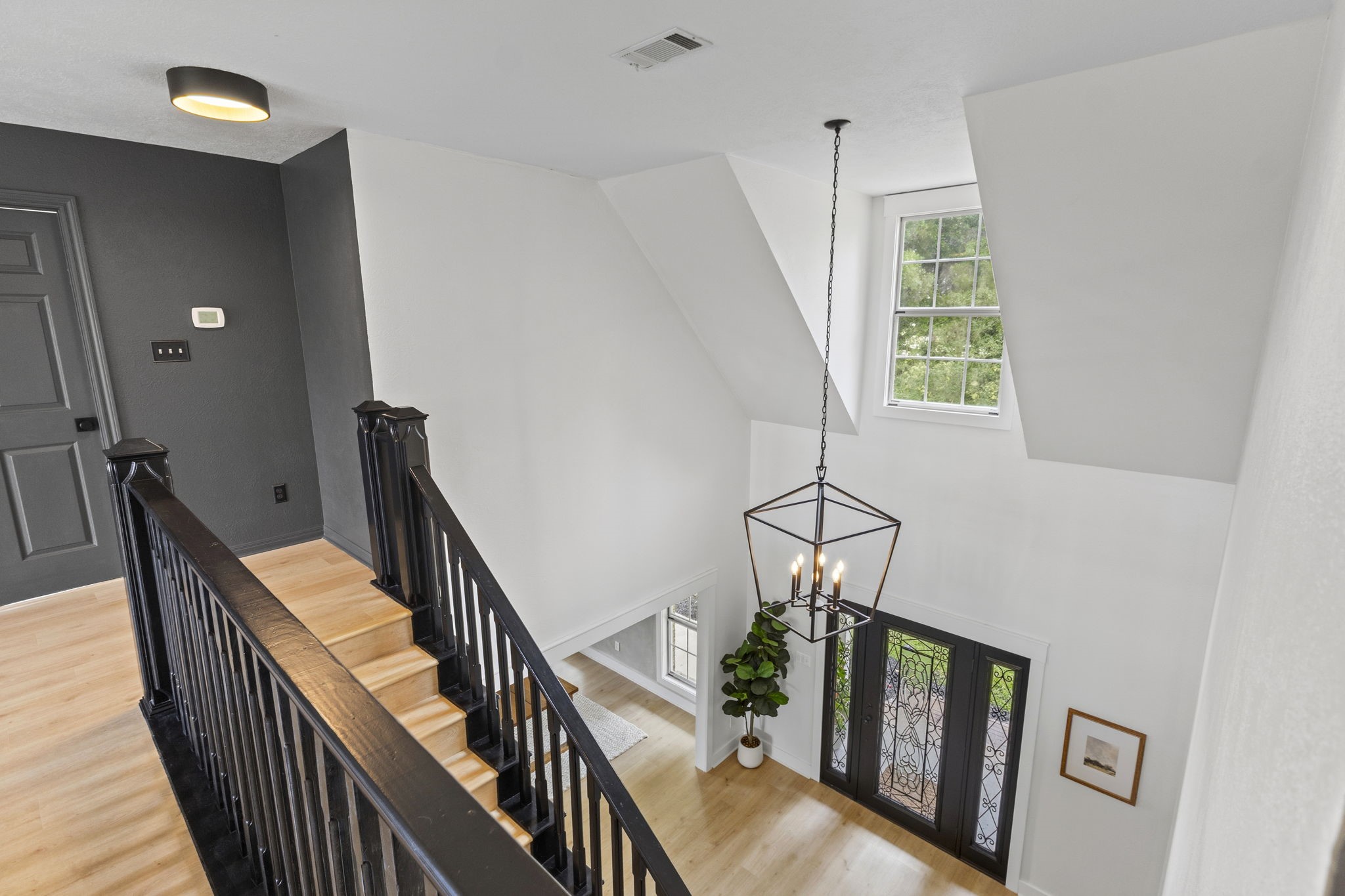 16421 Westbury Road Beaumont, TX 77713 - Photo 17 of 29 a view of a hallway with windows