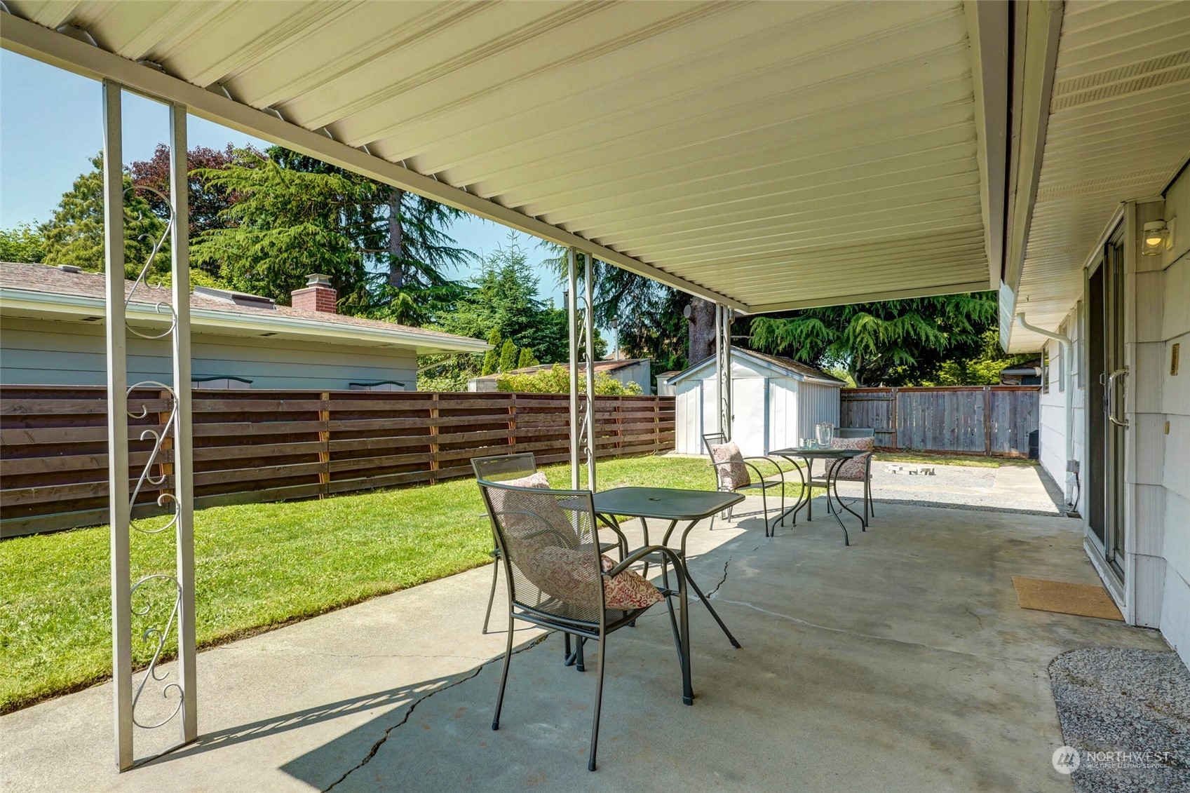 2309 Edmonds Avenue Northeast Renton, WA 98056 - Photo 23 of 35 a view of a chair and tables in the patio