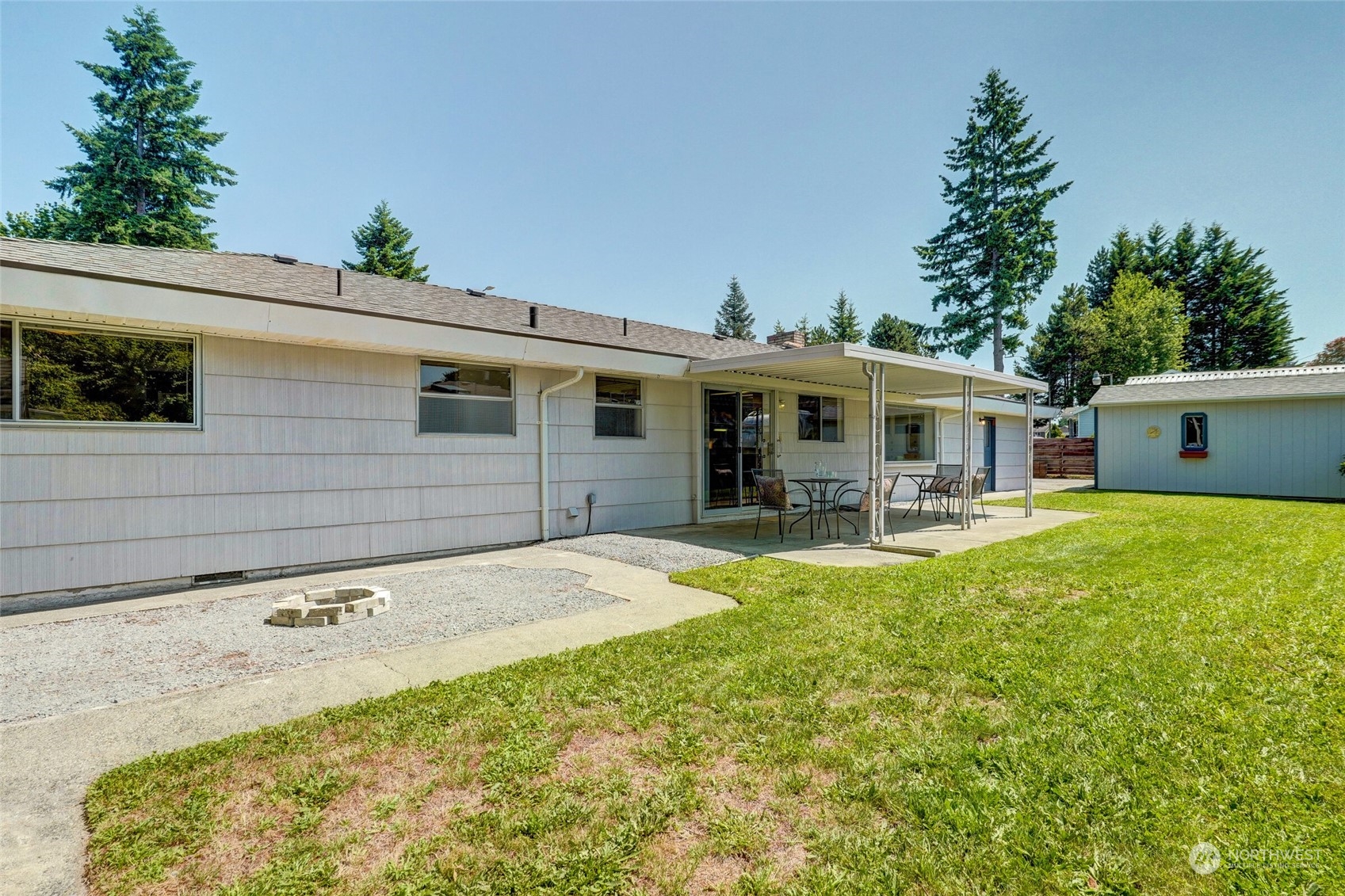 2309 Edmonds Avenue Northeast Renton, WA 98056 - Photo 25 of 35 a front view of a house with swimming pool