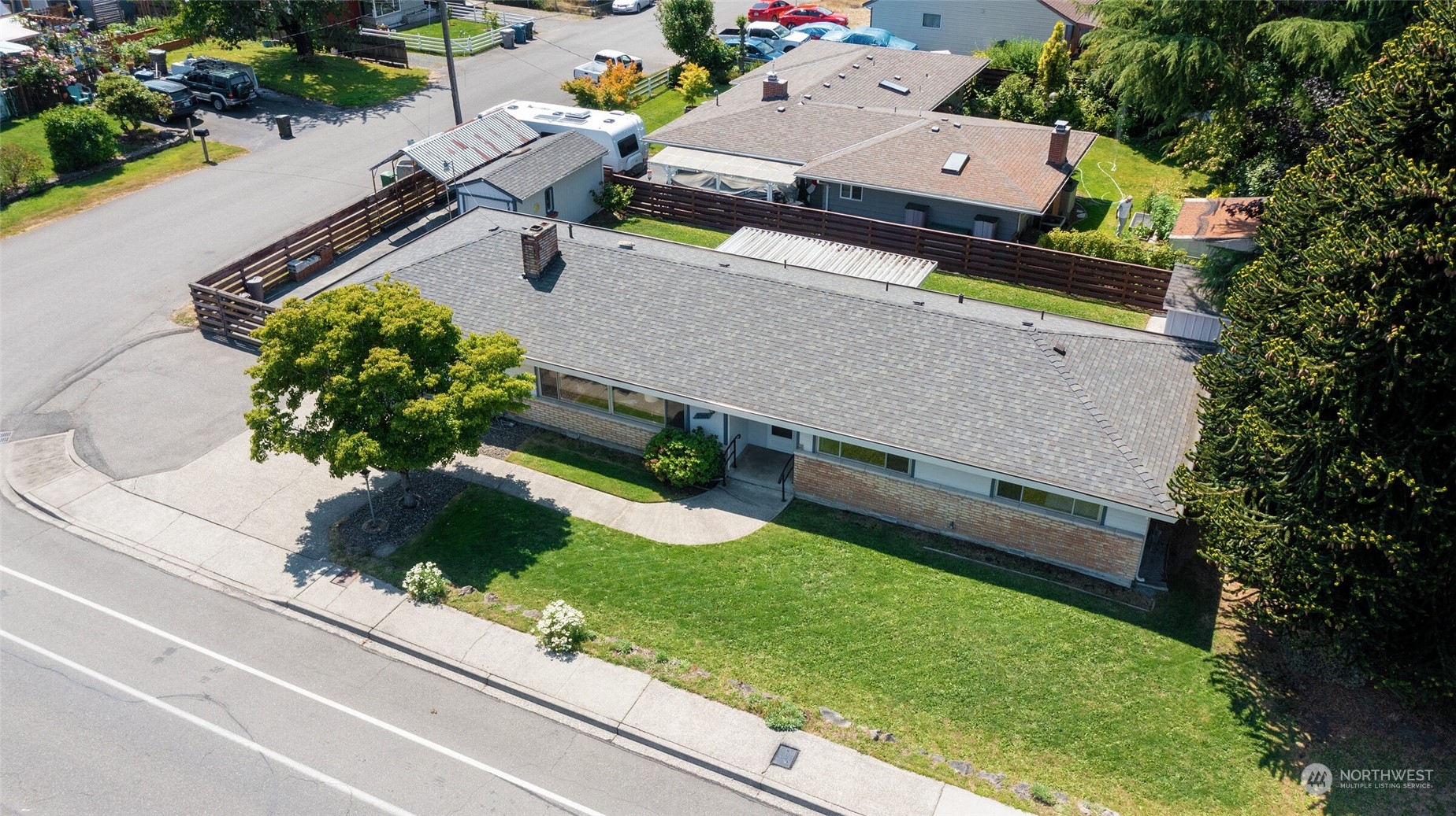 2309 Edmonds Avenue Northeast Renton, WA 98056 - Photo 29 of 35 an aerial view of a house with a yard and a garden