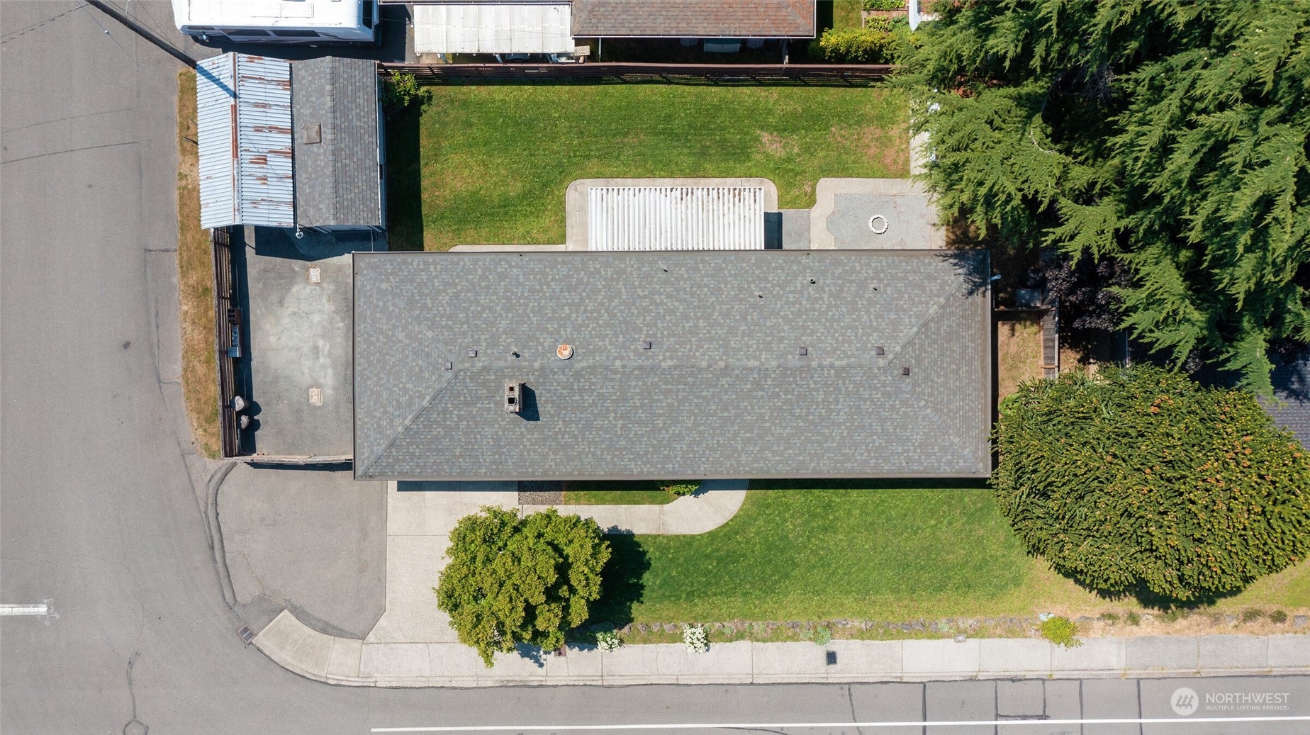 2309 Edmonds Avenue Northeast Renton, WA 98056 - Photo 31 of 35 an aerial view of a house with a yard