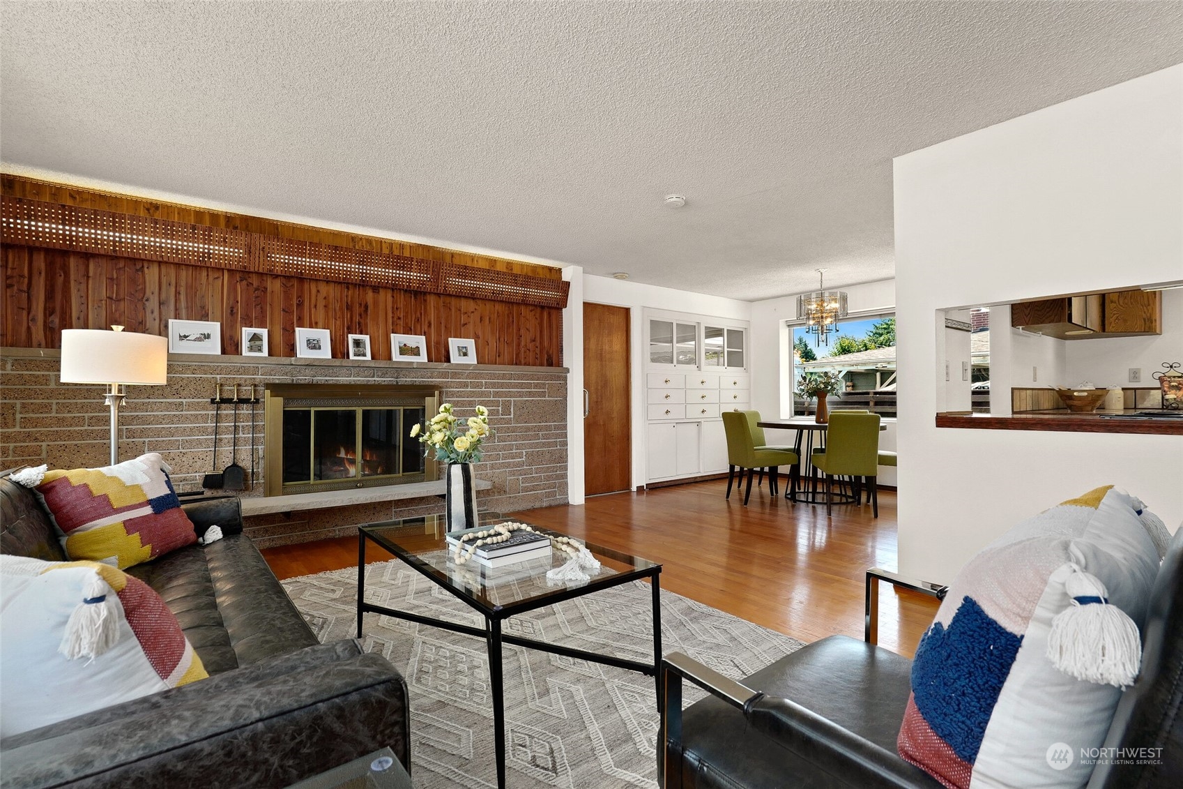 2309 Edmonds Avenue Northeast Renton, WA 98056 - Photo 5 of 35 a living room with furniture and a kitchen view