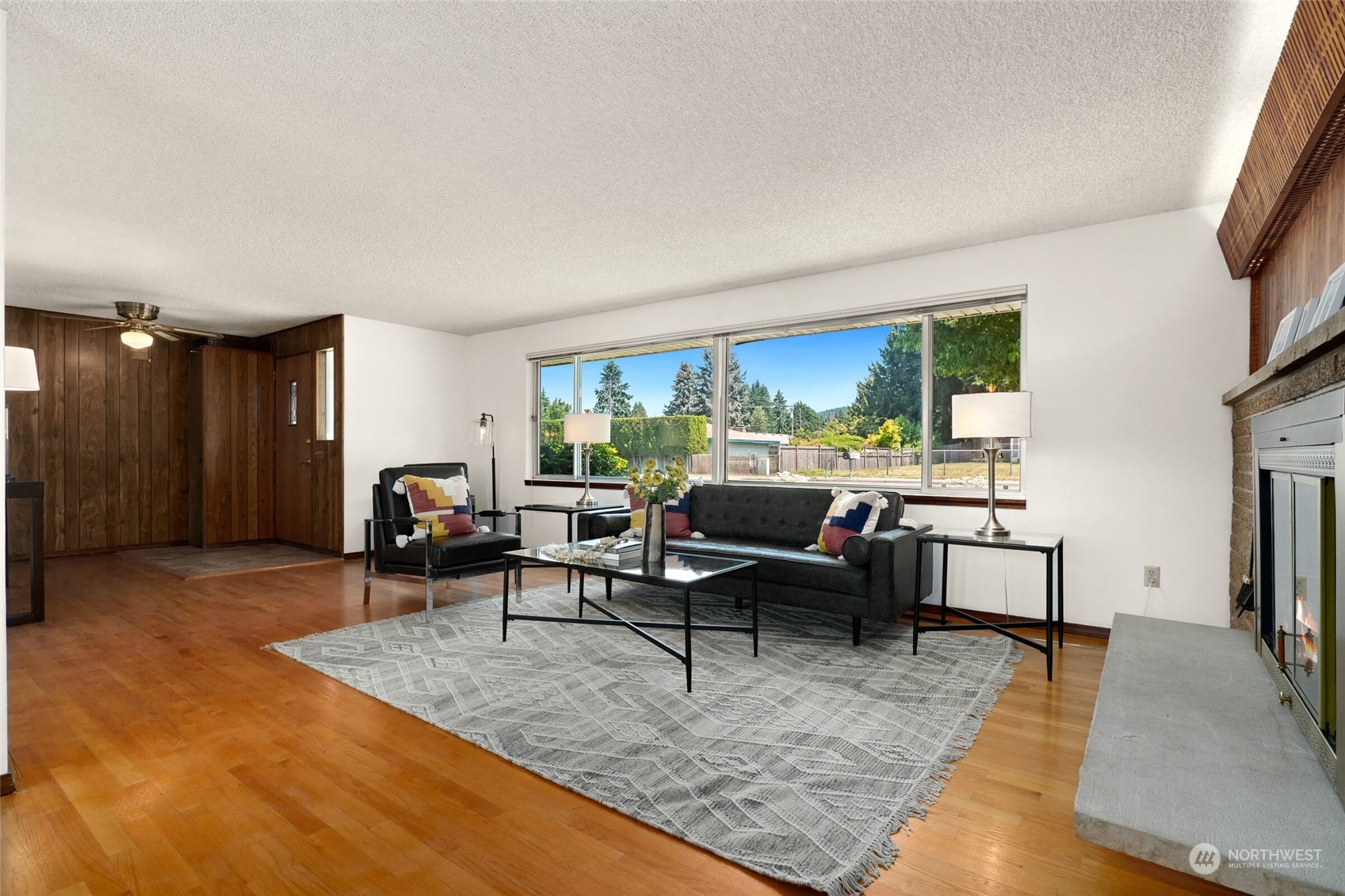 2309 Edmonds Avenue Northeast Renton, WA 98056 - Photo 6 of 35 a living room with furniture rug and window