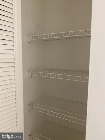 a bathroom with a sink toilet and vanity