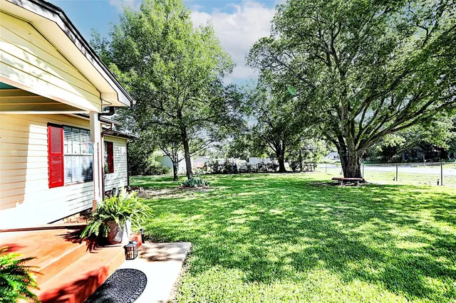 a house view with a garden space