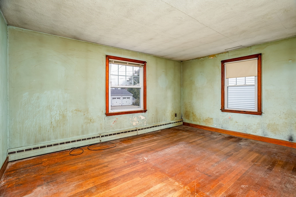49 Bennett Street Chicopee, MA 01013 - Photo 12 of 42 an empty room with windows