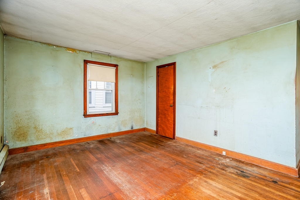 49 Bennett Street Chicopee, MA 01013 - Photo 13 of 42 a view of empty room with window