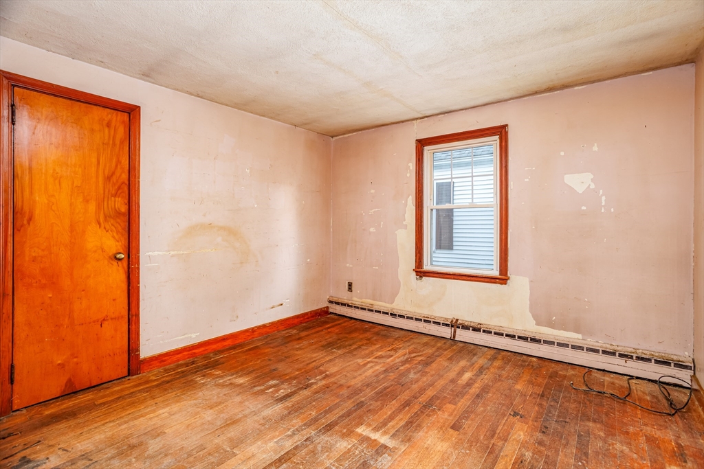 49 Bennett Street Chicopee, MA 01013 - Photo 15 of 42 an empty room with a window