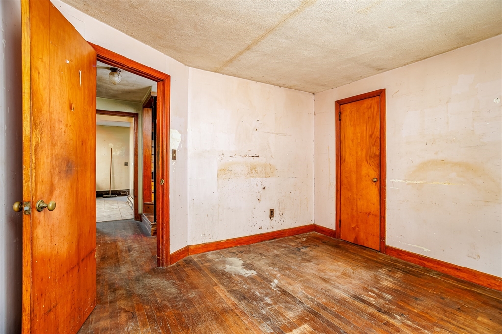 49 Bennett Street Chicopee, MA 01013 - Photo 19 of 42 an empty room with a natural light