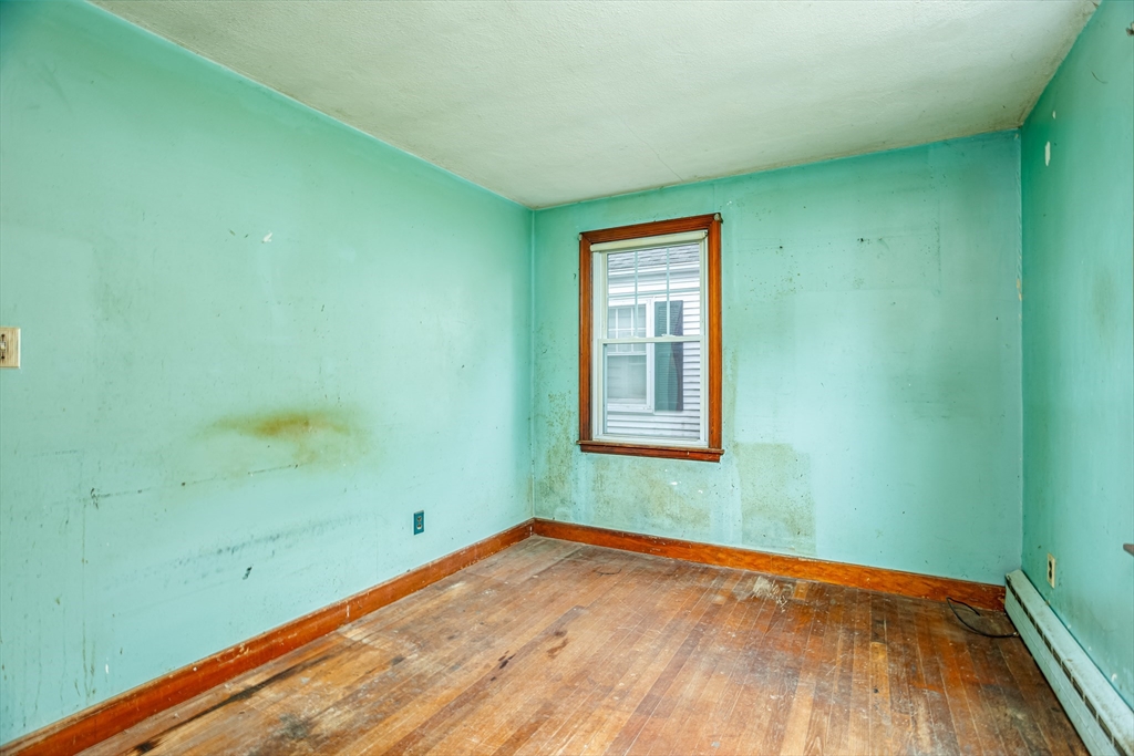 49 Bennett Street Chicopee, MA 01013 - Photo 21 of 42 an empty room with a window